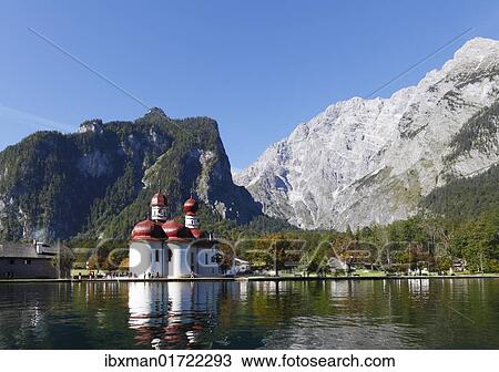 "St. Bartholomae pilgrimage church, Lake Koenigssee, Mt. Watzmann on the right, Nationalpark Berchtesgaden national park, Berchtesgadener Land, Upper Bavaria, Bavaria, Germany, Europe" View Large Photo Image Stock Image - "St. Bartholomae pilgrimage church, Lake Koenigssee, Mt. Watzmann on the right, Nationalpark Berchtesgaden national park, Berchtesgadener Land, Upper Bavaria, Bavaria, Germany, Europe". Fotosearch