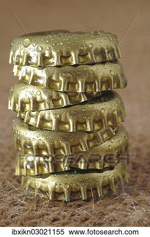 Stacked bottle caps View Large Photo Image Stock Photography - Stacked bottle caps. Fotosearch