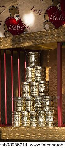 Picture - "Stacked cans for throwing at, Oktoberfest, Theresienwiese, Munich, Upper Bavaria, Bavaria, Germany, Europe". Fotosearch