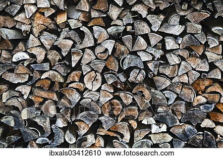 Stock Image - Stacked firewood. Fotosearch