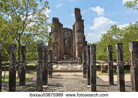 Stock Photo - "Statue house with headless Buddha statue, stone pillars in front, Lankatilaka Gedige, Alahana Pirivena Group, Archaeological Park, Polonnaruwa, Sri Lanka, Asia". Fotosearch