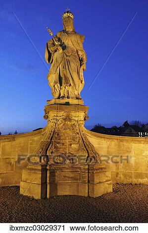 "Statue of Empress Cunegonde, 980-1033, on Unteren Bruecke, Lower Bridge, in the evening light against the blue night sky, Untere Brucke, Altstadt, Bamberg, Upper Franconia, Bavaria, Germany, Europe" View Large Photo Image Stock Image - "Statue of Empress Cunegonde, 980-1033, on Unteren Bruecke, Lower Bridge, in the evening light against the blue night sky, Untere Brucke, Altstadt, Bamberg, Upper Franconia, Bavaria, Germany, Europe". Fotosearch