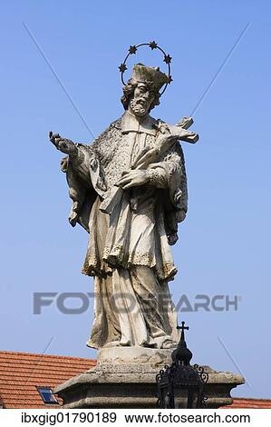 "Statue of St. John of Nepomuk at Piarist Square at the Church of Ascension of Virgin Mary in Straznice, Hodonin district, South Moravia region, Czech Republic, Europe" View Large Photo Image Stock Photo - "Statue of St. John of Nepomuk at Piarist Square at the Church of Ascension of Virgin Mary in Straznice, Hodonin district, South Moravia region, Czech Republic, Europe". Fotosearch