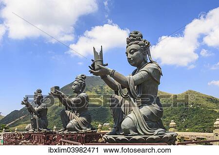"Statues of Devas making offerings at Tian Tan Buddha image at Po Lin Monastery, Lantau Island, Hong Kong, China, Asia" View Large Photo Image Stock Image - "Statues of Devas making offerings at Tian Tan Buddha image at Po Lin Monastery, Lantau Island, Hong Kong, China, Asia". Fotosearch