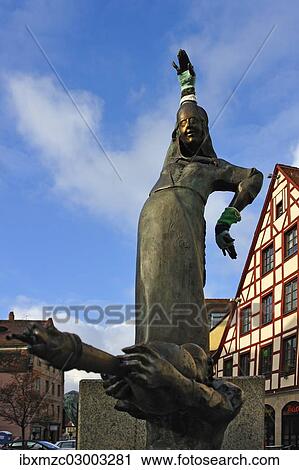 "Statues wearing gloves on the Gauklerbrunnen well by artist Harro Frey, an old half-timbered house at the back, Gruener Markt square, historic district, Marktplatz. Altstadt, Fuerth, Middle Franconia, Bavaria, Germany, Europe" View Large Photo Image Stock Image - "Statues wearing gloves on the Gauklerbrunnen well by artist Harro Frey, an old half-timbered house at the back, Gruener Markt square, historic district, Marktplatz. Altstadt, Fuerth, Middle Franconia, Bavaria, Germany, Europe". Fotosearch