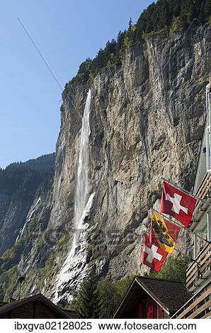 "Staubach Falls and flags of Switzerland and the canton of Bern, Lauterbrunnen, Bernese Oberland, Switzerland, Europe" View Large Photo Image Stock Photography - "Staubach Falls and flags of Switzerland and the canton of Bern, Lauterbrunnen, Bernese Oberland, Switzerland, Europe". Fotosearch