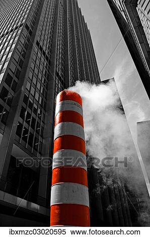 "Steaming chimney at a construction site in front of skyscrapers, Down Town, New York, New York City, New York, United States, North America" View Large Photo Image Stock Photography - "Steaming chimney at a construction site in front of skyscrapers, Down Town, New York, New York City, New York, United States, North America". Fotosearch