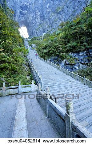 Picture - "Steep staircase with 900 steps to Heaven's Gate, Tianmen Cave, the world's largest natural water eroded cave, Tianmen National Park, Hunan Province, China, Asia". Fotosearch