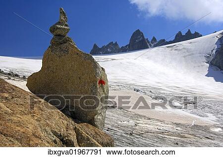 "Steinmaennl, cairn made of stacked stones as a signpost on the edge of Orny Glacier in the Valais Alps, Switzerland, Europe" View Large Photo Image Stock Image - "Steinmaennl, cairn made of stacked stones as a signpost on the edge of Orny Glacier in the Valais Alps, Switzerland, Europe". Fotosearch