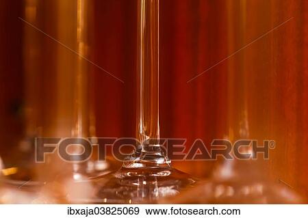Stems of wine glasses View Large Photo Image Stock Photo - Stems of wine glasses. Fotosearch