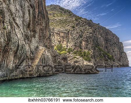 "Steps on the rocky coast, Sa Calobra, Serra de Tramuntana, Majorca, Balearic Islands, Spain, Europe" View Large Photo Image Stock Image - "Steps on the rocky coast, Sa Calobra, Serra de Tramuntana, Majorca, Balearic Islands, Spain, Europe". Fotosearch