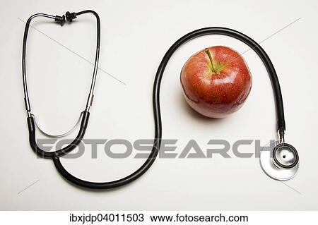 "Stethoscope and red apple, concept: An apple a day keeps the doctor away" View Large Photo Image Stock Image - "Stethoscope and red apple, concept: An apple a day keeps the doctor away". Fotosearch