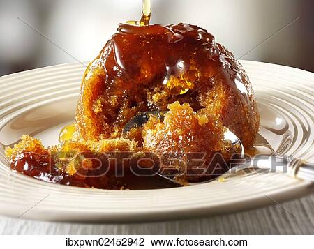 Sticky toffee sponge pudding View Large Photo Image Stock Image - Sticky toffee sponge pudding. Fotosearch