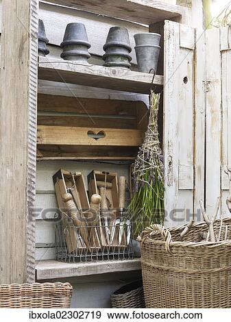 "Still life, old garden accessories, zinc pots and tools" View Large Photo Image Stock Photo - "Still life, old garden accessories, zinc pots and tools". Fotosearch