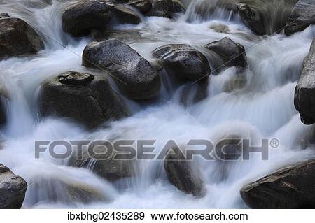 "Stones in a river, Alps, Foroglio, Switzerland, Europe" View Large Photo Image Stock Photo - "Stones in a river, Alps, Foroglio, Switzerland, Europe". Fotosearch