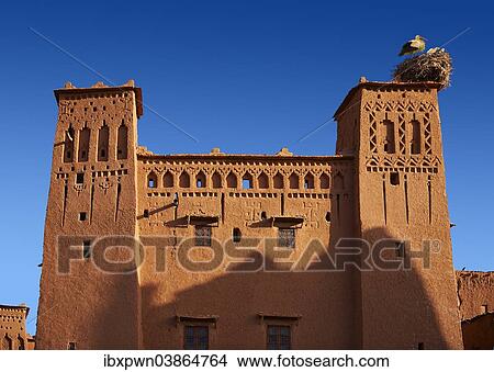 "Stork's nest on the mud buildings of the fortified Berber Ksar of Ait Benhaddou, Sous-Massa-Dra, Morocco, Africa" View Large Photo Image Picture - "Stork's nest on the mud buildings of the fortified Berber Ksar of Ait Benhaddou, Sous-Massa-Dra, Morocco, Africa". Fotosearch