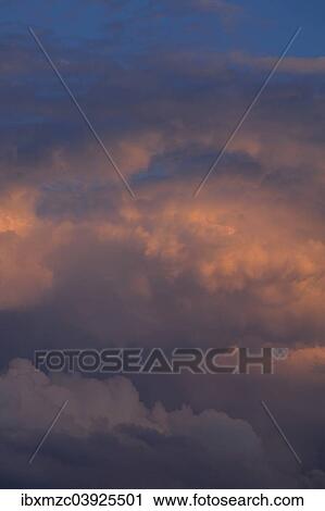 Stock Image - "Storm clouds in the evening light, Bavaria, Germany, Europe". Fotosearch