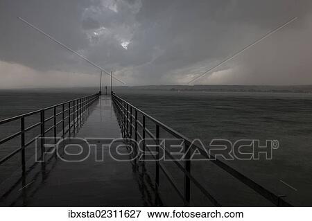 "Stormy sky with rain over Lake Constance near Konstanz, Baden-Wuerttemberg, Germany, Europe" View Large Photo Image Stock Photo - "Stormy sky with rain over Lake Constance near Konstanz, Baden-Wuerttemberg, Germany, Europe". Fotosearch
