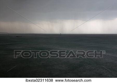 Stock Photo - "Stormy sky with rain over Lake Constance near Konstanz, Baden-Wuerttemberg, Germany, Europe". Fotosearch