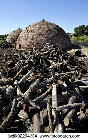Picture - "Stove and firewood, logging, charcoal production, Chaco, Santiago del Estero Province, Argentina, South America". Fotosearch