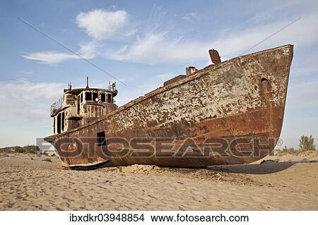 "Stranded ship at the port of MoÊ»ynoq or Muinak, Aral Sea, Karakalpakstan, Uzbekistan, Asia" View Large Photo Image Picture - "Stranded ship at the port of MoÊ»ynoq or Muinak, Aral Sea, Karakalpakstan, Uzbekistan, Asia". Fotosearch