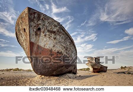 Stock Photo - "Stranded ships at the port of MoÊ»ynoq or Muinak, Aral Sea, Karakalpakstan, Uzbekistan, Asia". Fotosearch