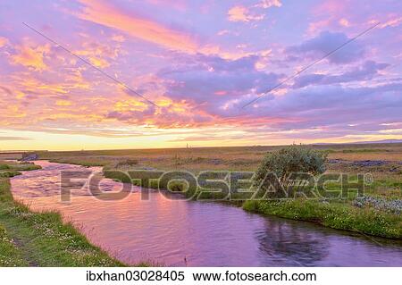 "Stream in the afterglow of the sunset, Iceland, Europe" View Large Photo Image Stock Photography - "Stream in the afterglow of the sunset, Iceland, Europe". Fotosearch