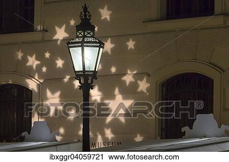 "Street lamp with Christmas lights and Hofburg Palace, Michaelerplatz square, Innere Stadt district, Vienna, Austria, Europe" View Large Photo Image Stock Image - "Street lamp with Christmas lights and Hofburg Palace, Michaelerplatz square, Innere Stadt district, Vienna, Austria, Europe". Fotosearch