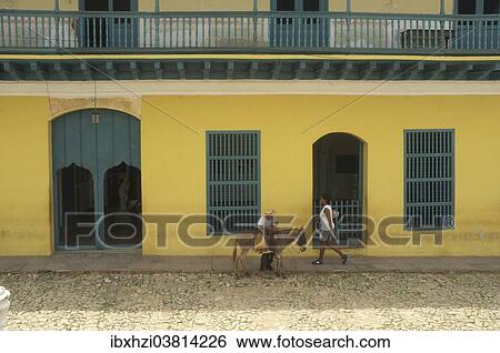 Stock Photograph - "Street scene with a donkey, Trinidad, Cuba, North America". Fotosearch