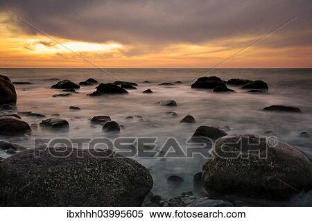 "Stretch of coast with rocks just before sunset, near Ahrenshoop, Fischland, Mecklenburg-Western Pomerania, Germany, Europe" View Large Photo Image Stock Photography - "Stretch of coast with rocks just before sunset, near Ahrenshoop, Fischland, Mecklenburg-Western Pomerania, Germany, Europe". Fotosearch