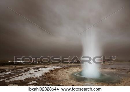 Picture - "Strokkur, fountain geyser, with volcanic ash cloud, South Iceland, Iceland, Europe". Fotosearch