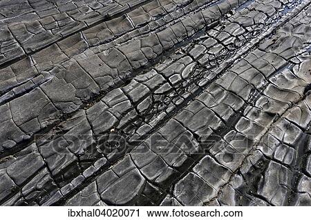 "Structures in a rock on the beach of Nagpali, Myanmar, Asia" View Large Photo Image Stock Image - "Structures in a rock on the beach of Nagpali, Myanmar, Asia". Fotosearch