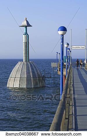 "Submerged gondola at the pier of Zingst, Darss, Mecklenburg-Western Pomerania, Germany, Europe" View Large Photo Image Stock Photo - "Submerged gondola at the pier of Zingst, Darss, Mecklenburg-Western Pomerania, Germany, Europe". Fotosearch