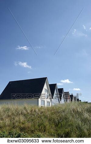 "Summer cottages, several coloured wooden houses in the dunes, Hornum, Sylt, Schleswig-Holstein, Germany, Europe" View Large Photo Image Stock Image - "Summer cottages, several coloured wooden houses in the dunes, Hornum, Sylt, Schleswig-Holstein, Germany, Europe". Fotosearch