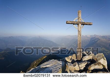 "Summit cross on Mt Ifinger or Ivigna in morning light, Meran or Merano below, Vinschgau or Val Vernosta in the back, Meran 2000, South Tyrol, Italy, Europe" View Large Photo Image Stock Image - "Summit cross on Mt Ifinger or Ivigna in morning light, Meran or Merano below, Vinschgau or Val Vernosta in the back, Meran 2000, South Tyrol, Italy, Europe". Fotosearch