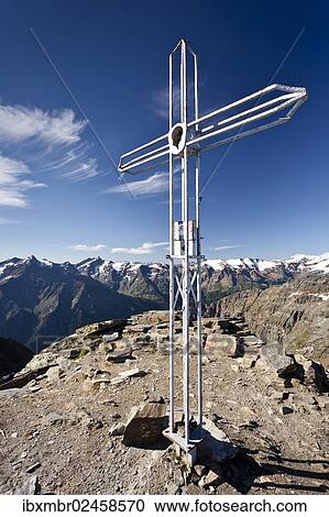 "Summit cross on Orgelspitz or Laaser Spitz Mountain above Laas, Vinschgau, overlooking the Martell Valley, Alto Adige, Italy, Europe" View Large Photo Image Stock Image - "Summit cross on Orgelspitz or Laaser Spitz Mountain above Laas, Vinschgau, overlooking the Martell Valley, Alto Adige, Italy, Europe". Fotosearch