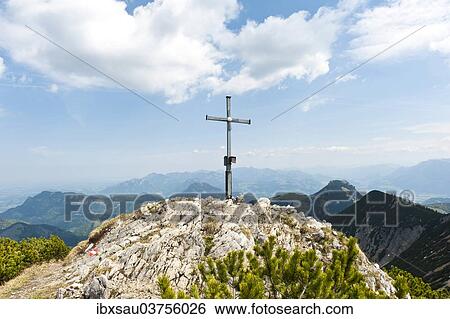 Stock Photograph - "Summit cross on the limestone peak of Grosser Traithen Mountain, 1852 m, Mangfall Mountains, Upper Bavaria, Bavaria, Germany, Europe". Fotosearch