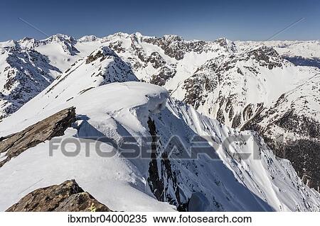 "Summit ridge with overhanging snow en route to Mt Laaser Orgelspitze in Val Martello, Martelltal valley, and the Stelvio National Park, Ortler Alps with Mt King, Mt Zebru and Mt Ortler, Vinschgau, South Tyrol, Trentino-Alto Adige, Italy, Europe" View Large Photo Image Stock Photography - "Summit ridge with overhanging snow en route to Mt Laaser Orgelspitze in Val Martello, Martelltal valley, and the Stelvio National Park, Ortler Alps with Mt King, Mt Zebru and Mt Ortler, Vinschgau, South Tyrol, Trentino-Alto Adige, Italy, Europe". Fotosearch