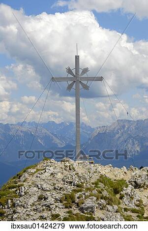 Stock Photo - "Summit with summit cross, Mt. Kramer or Mt. Kramerspitz, 1985m, near Garmisch-Partenkirchen, Werdenfelser Land area, Upper Bavaria, Bavaria, Germany, Europe". Fotosearch
