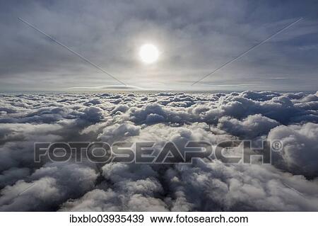 "Sun above the clouds, North Rhine-Westphalia, Germany, Europe" View Large Photo Image Stock Photo - "Sun above the clouds, North Rhine-Westphalia, Germany, Europe". Fotosearch