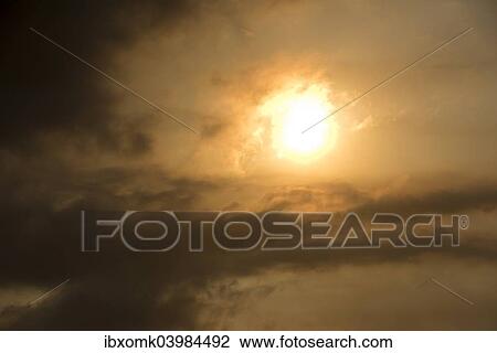 "Sun behind clouds and brownish ash and gas clouds of the Holuhraun fissure eruption, north of the Baroarbunga volcano, highlands of Iceland, Northeastern Region, Iceland, Europe" View Large Photo Image Stock Image - "Sun behind clouds and brownish ash and gas clouds of the Holuhraun fissure eruption, north of the Baroarbunga volcano, highlands of Iceland, Northeastern Region, Iceland, Europe". Fotosearch