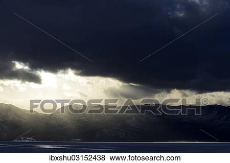 "Sun breaks through the clouds at the frozen Lake Kussharo, Akan-Nationalpark, Kawayu Onsen, Hokkaido, Japan, Asia" View Large Photo Image Stock Photo - "Sun breaks through the clouds at the frozen Lake Kussharo, Akan-Nationalpark, Kawayu Onsen, Hokkaido, Japan, Asia". Fotosearch