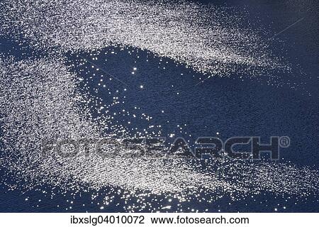 "Sun rays reflecting on the surface of a mountain lake, Durchlassboden reservoir, Gerlos Pass, Tyrol, Austria, Europe" View Large Photo Image Stock Image - "Sun rays reflecting on the surface of a mountain lake, Durchlassboden reservoir, Gerlos Pass, Tyrol, Austria, Europe". Fotosearch
