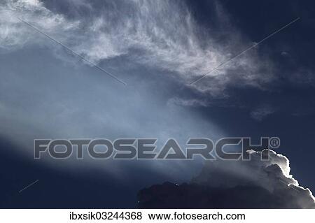 "Sun rays through a cloudy sky, Upper Swabia, Baden-Wurttemberg, Germany, Europe" View Large Photo Image Stock Photo - "Sun rays through a cloudy sky, Upper Swabia, Baden-Wurttemberg, Germany, Europe". Fotosearch