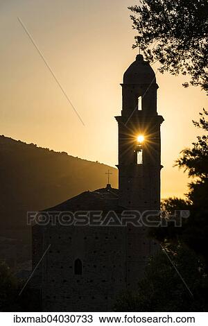 "Sun shining through a belfry, silhouette of a church tower, evening mood, sunset, Haute-Corse, Corsica, France, Europe" View Large Photo Image Stock Image - "Sun shining through a belfry, silhouette of a church tower, evening mood, sunset, Haute-Corse, Corsica, France, Europe". Fotosearch