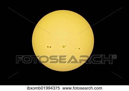 "Sun with solar spots in the white light, yellow filter" View Large Photo Image Stock Photography - "Sun with solar spots in the white light, yellow filter". Fotosearch