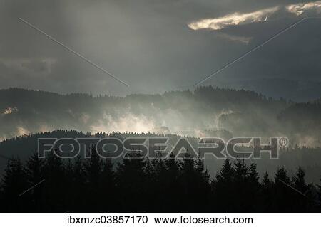 "Sunbeams breaking through rain clouds, Weitnau, Oberallgau, Bavaria, Germany, Europe" View Large Photo Image Stock Image - "Sunbeams breaking through rain clouds, Weitnau, Oberallgau, Bavaria, Germany, Europe". Fotosearch