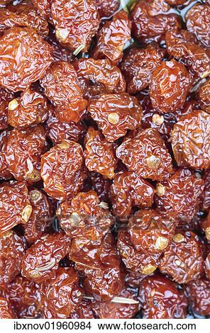 Sundried tomatoes in olive oil View Large Photo Image Picture - Sundried tomatoes in olive oil. Fotosearch
