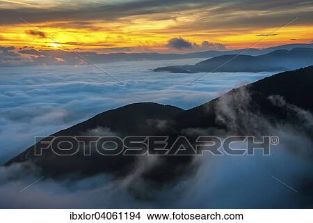 "Sunrise above the clouds, Mount Cucco, Umbria, Apennines, Italy, Europe" View Large Photo Image Picture - "Sunrise above the clouds, Mount Cucco, Umbria, Apennines, Italy, Europe". Fotosearch