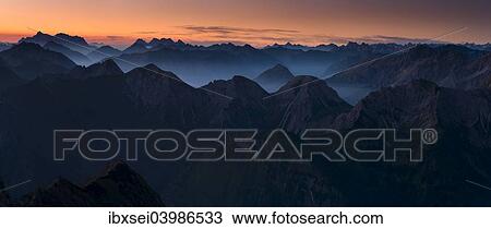 "Sunrise above the peaks of the Allgau Alps in steplike arrangement, Oberstdorf, Bavaria, Germany, Europe" View Large Photo Image Stock Image - "Sunrise above the peaks of the Allgau Alps in steplike arrangement, Oberstdorf, Bavaria, Germany, Europe". Fotosearch